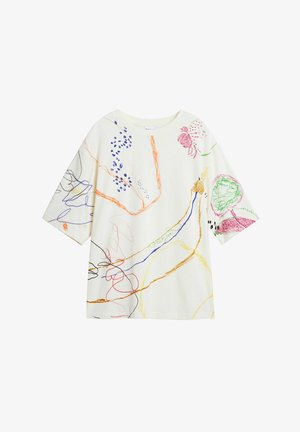T-shirt i bomull i krämfärg med korta ärmar. Har färgglada, abstrakta linjeteckningar i röd, blå, grön och gul. Avslappnad passform.