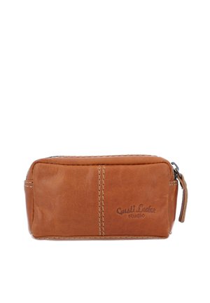 Brown leather rectangular pouch with stitched details and a zipper on top, embossed with "Gusti Leder studio" logo.