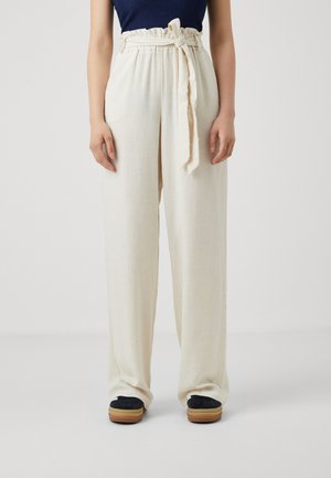 Cream-colored, wide-leg trousers made of a textured fabric, featuring a high waist with a tied belt accent and side pockets.
