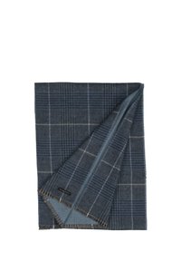 Écharpe en laine de couleur bleu foncé avec un motif à carreaux. Présente une texture douce et des bords frangés. Doublée d'un dessous bleu uni.