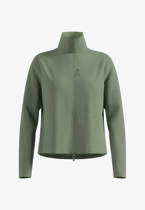 Reißverschluss-Pullover in Hellgrün. Strukturiertes Material, hoher Kragen und lange Ärmel. Mit einem Frontreißverschluss und verstellbarem Saum für eine optimale Passform.