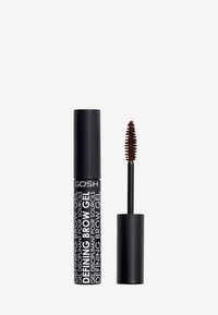 Black mascara tube with white text reading “DEFINING BROW GEL.” Includes a small, spiraled applicator brush next to the tube.