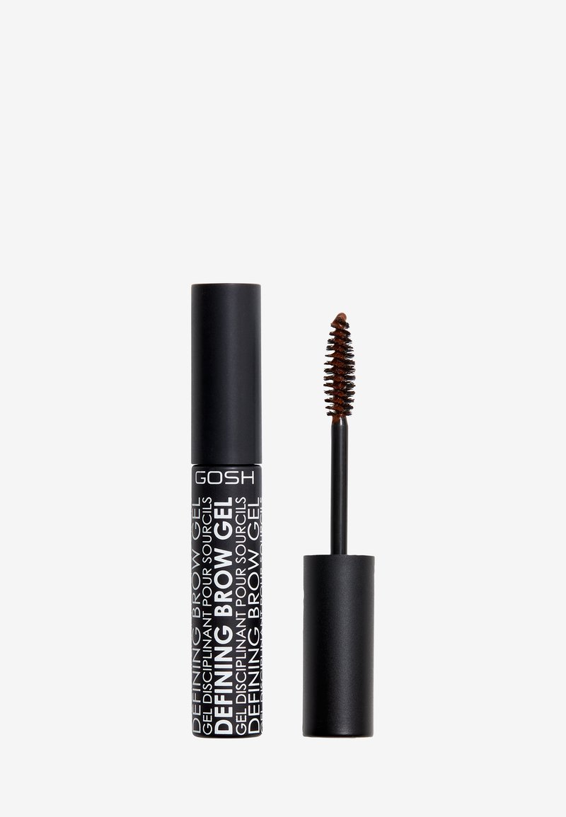 Black mascara tube with white text reading “DEFINING BROW GEL.” Includes a small, spiraled applicator brush next to the tube.
