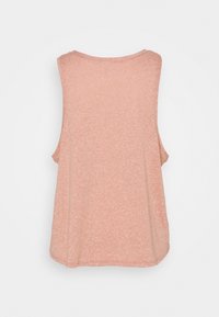 Ärmlös ljusrosa linne i texturerad tyg, med rund halsringning och en avslappnad passform, med rundad nederkant.