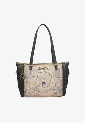 Borsa a tracolla in materiale sintetico beige e nero con disegni artistici. Presenta doppi manici e dettagli in hardware dorato.