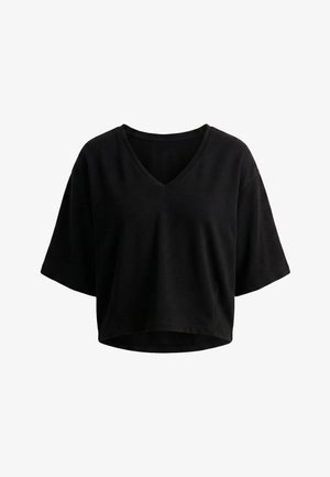 Zwart, kort mouws, V-hals, loszittend cropped topje met een licht gebogen zoom, weergegeven op een witte achtergrond.