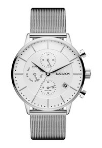 Sølv mesh reim klokke med hvit urskive, tre subskiver for dato og dual tid, samt svarte time markører. Har et datovindu klokken 6.