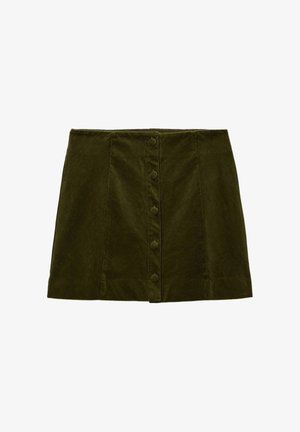 Jupe en velours côtelé vert à coupe droite, avec une fermeture à boutons sur le devant et un tissu texturé. La longueur est au-dessus du genou.