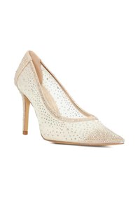Beige pointed-toe high-heel shoe with a transparent side and embellished with small clear rhinestones. Slim stiletto heel. Smooth texture.