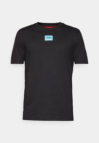 DIRAGOLINO - T-shirts - schwarz