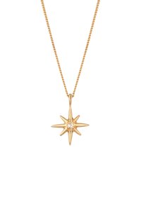 Goldener Anhänger in Sternform mit einem klaren Stein in der Mitte, der an einer verdrehten goldenen Kette hängt, mit polierter Oberfläche und spitzem Design.