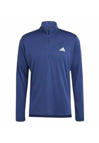 Tmavě modrý svetr s dlouhým rukávem a polovičním zipem, vyrobený z texturovaného materiálu, s bílým logem Adidas na hrudi.