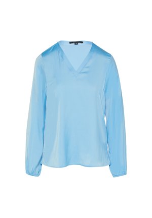 Blouse satiné bleu clair à manches longues, décolleté en V et poignets élastiques. Texture lisse avec un design fluide, idéale pour le superposition.