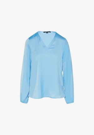 Blouse satiné bleu clair à manches longues, décolleté en V et poignets élastiques. Texture lisse avec un design fluide, idéale pour le superposition.