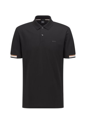 Polo noir en coton doux. Doté d'un col classique, d'une patte de boutonnage à trois boutons et d'accents rayés sur les manches.