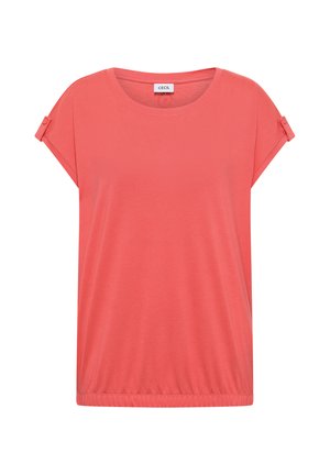 Blusa coral de manga corta con escote redondeado y pestañas en las mangas con botones, fabricada en tejido suave con dobladillo elástico.