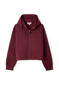 Sudadera corta en color burdeos, hecha de una tela suave, con cremallera frontal, gran capucha y puños acanalados. Textura suave con un diseño minimalista.
