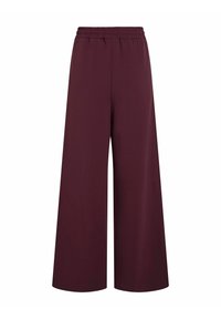 Kalhoty širokého střihu v tmavě burgundské barvě, s elastickým pasem. Design je hladký, bez dalších vzorů či kovových prvků.