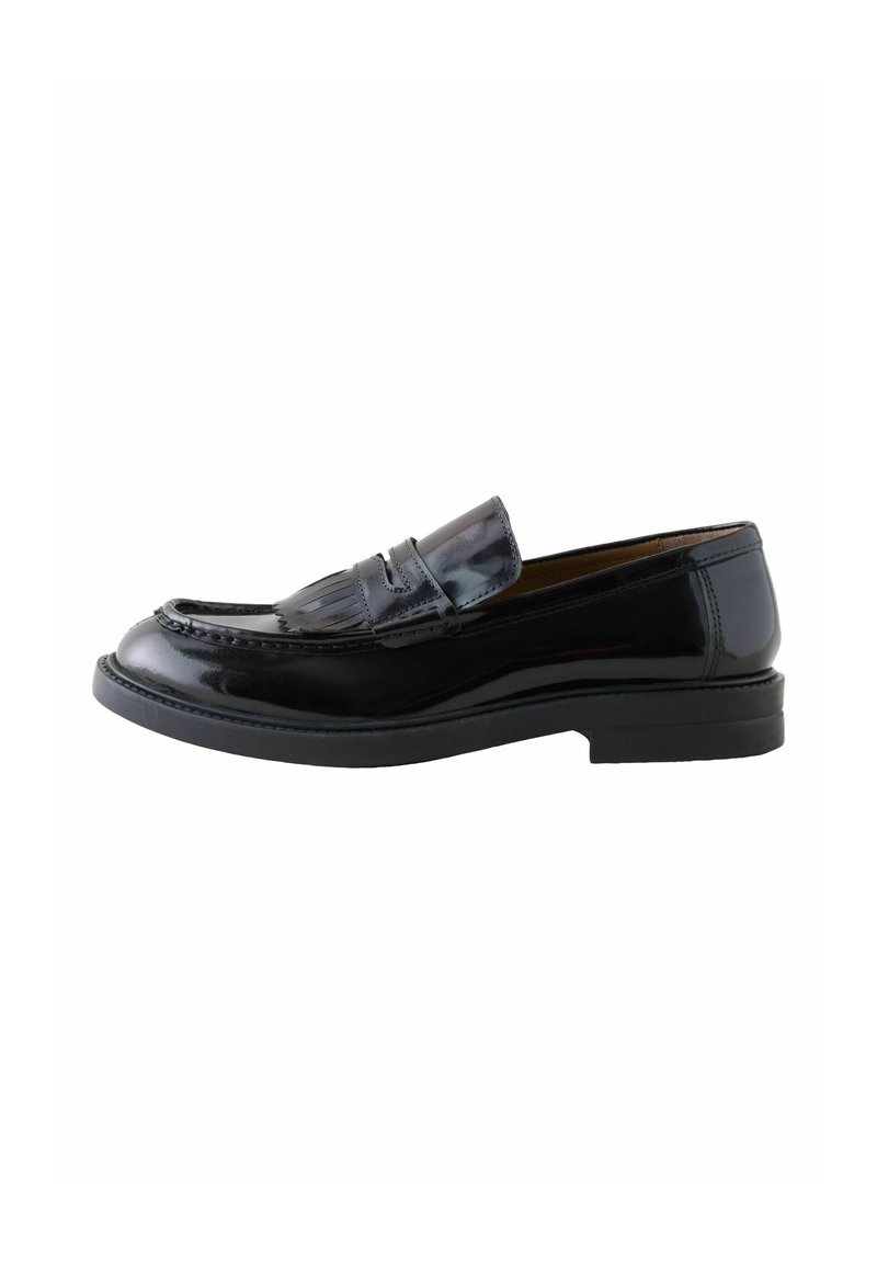 Black patent leather loafer with a rounded toe, decorative fringe detail, and a low, textured rubber sole. Classic slip-on design.