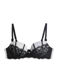 Black lace bra with underwire and removable straps, featuring floral lace overlay, a smooth fabric base, and a decorative center bow.