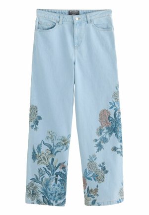Light blue denim jeans with wide legs and intricate floral embroidery in shades of blue, white, and pink on lower legs.