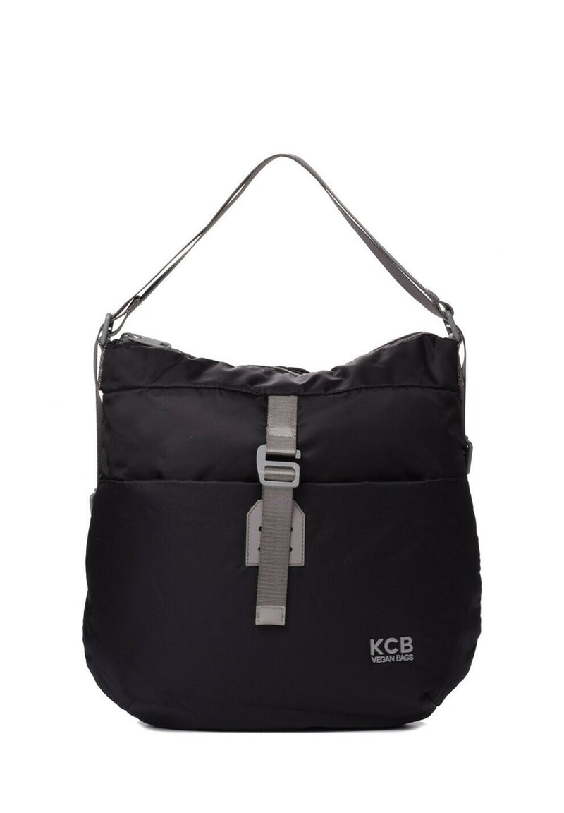 Bolso de hombro de cuero vegano negro con textura suave, correa ajustable, cierre superior con cremallera y logo KCB prominente en la parte frontal.