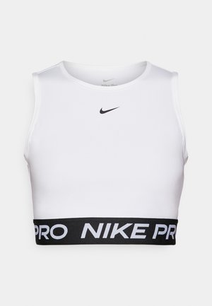 White crop top with wide black elastic band featuring "NIKE PRO" text, minimalist design, and a small black Nike logo on the front.