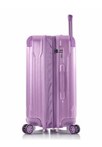Purple hard-shell suitcase with horizontal ridges, combination lock, retractable handle, and four multi-directional wheels for easy maneuverability.