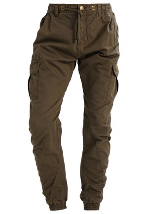 Pantalons cargo en vert olive, fabriqués en coton. Dotés d'une taille élastique, d'un cordon de serrage, de poches latérales et de poignets fuselés. Texture de tissu durable.