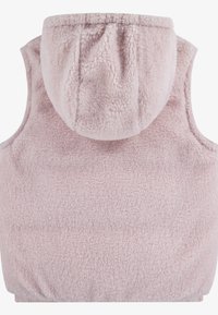 Fleece vest in soft pink with a hood, featuring a textured surface and sleeveless design. No front closure or additional detailing visible.