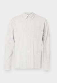 Chemise à manches longues boutonnée en gris clair avec un motif check texturé, une poche frontale et un col classique. Fabriquée en tissu tissé.