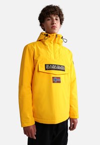 Yellow waterproof jacket with a front pocket, featuring a logo and a Norway flag patch. Designed with a hood and adjustable drawstrings.