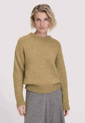 Mustard yellow knitted sweater with a round neckline, dropped shoulders, and ribbed hem. The texture appears soft and cozy.
