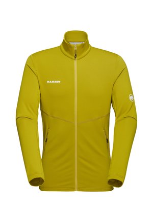 Gul fleecejakke med høj krave, fuld lynlås og sorte detaljer. Har to sidelommer og et logo på brystet og ærmet.