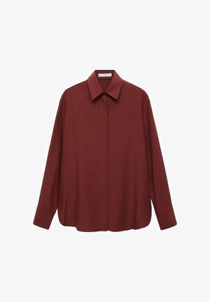 Burgundowa koszula z długim rękawem, z wyłogowym kołnierzykiem, z przodu zapinana na guziki i luźna. Wykonana z gładkiego materiału o minimalistycznym wzorze.