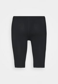 Svarte capri leggings laget av elastisk stoff, med en glatt tekstur, tettsittende design og lengde til midten av leggen uten synlige sømmer.