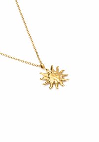 Collier en pendentif doré présentant un design en éclat de soleil avec des rayons texturés, suspendu à une fine chaîne délicate.