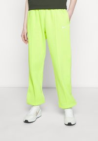 Nike Sportswear W NSW ESSNTL PANT FLC TREND - Calças de fato de treino - atomic green/white