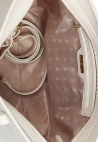 L'Atelier Du Sac CASSANDRE mleczny