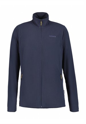 Chaqueta de forro polar de color azul marino con textura acanalada, cuello alto, cremallera frontal completa y dos bolsillos laterales con cremallera y acentos amarillos.