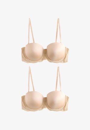 Zwei beige gepolsterte BHs mit Spitzenbesatz und verstellbaren Trägern, vorne und hinten auf weißem Hintergrund dargestellt.