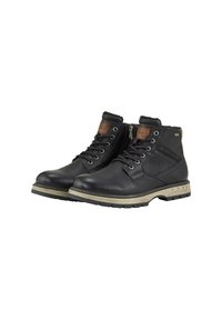 Botas de tobillo de cuero negro con cordones, suelas de goma beige, cremallera lateral y acentos marrones en el cuello y la lengua.