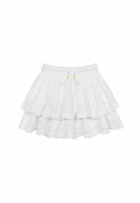 Falda blanca de volantes con detalles bordados, forrada con un borde de ojales. Cintura elástica con acentos de cordón amarillo y borlas.