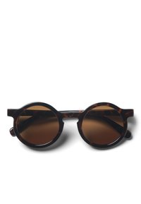 Occhiali da sole tondi con montatura in tartaruga, lenti marroni e un design unico del ponte. Texture liscia e costruzione robusta.