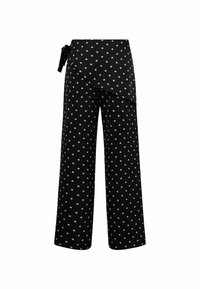 Čierne nohavice s širokými nohavicami a bielymi bodkami, s prekladaným dizajnom a viazaním v páse. Hladká látka s jemnou štruktúrou.