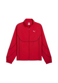 Rød letvægtsjakke med sorte accentlinjer, høj krave, fuld lynlås foran og Puma-logo på brystet. Har lange ærmer og elastiske manchetter.