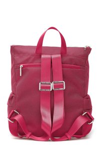 Bright pink mesh backpack with dual adjustable straps, exterior zip pocket, and silver hardware accents. Texture is woven and durable.