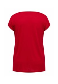 Rød kortærmet t-shirt med løs pasform, blødt stof og rund halsudskæring, med en glat tekstur og uden synlige mønstre eller detaljer.