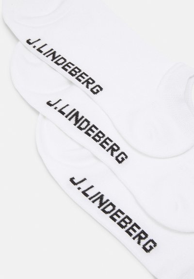 Hvide bomuldsankelsokker med sort broderet tekst "J. Lindeberg" langs siden, glat tekstur og standard ribbet manchet-design.