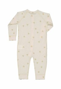 Krämfärgad babyromper med långärm och beige hjärtan, med åtsittande muddar och ben i full längd som ligger platt och visar baksidan.